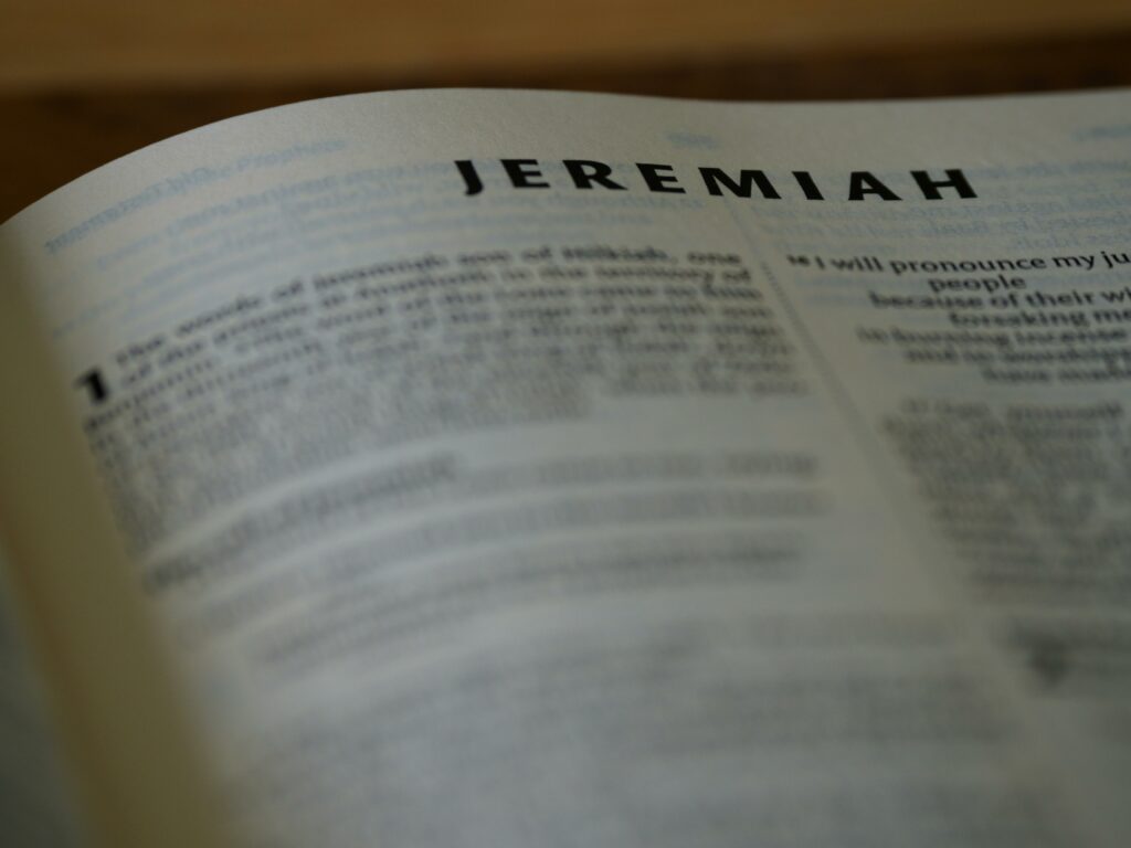 Detailed close-up of the Book of Jeremiah in the Holy Bible with text in focus.